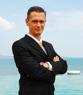 Royal Cliff Hotels Group’s general manager, Christoph Voegeli, with Royal Cliff Beach Hotel’s Infini poolside in the background.